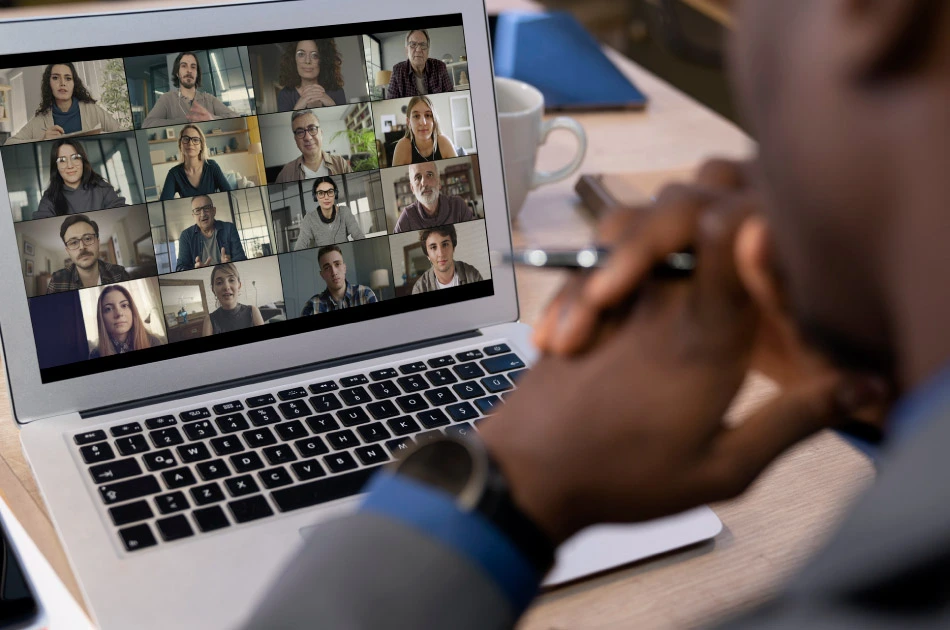 Talking and working on the computer in online conference call